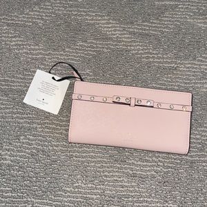 Brand new kate spade wallet with tags. Never used